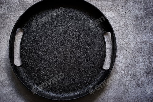 Preview: Textured Black Pan on a Grey Surface