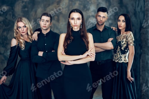 Preview: Group of young beautiful people posing in studio