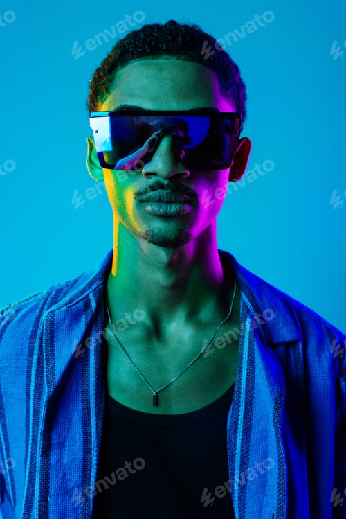 Preview: African man portrait in studio on colorful background
