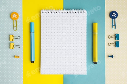 Preview: School supplies. Yellow and blue colors. Empty notebook. Flat lay composition. Space for text.