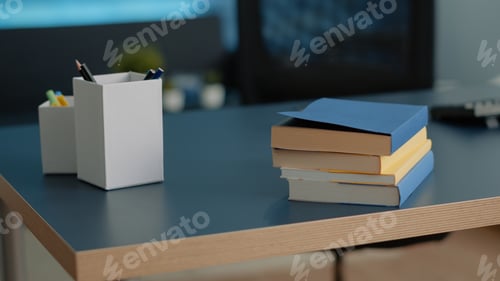 Preview: Close up of desk with school books for education and studying