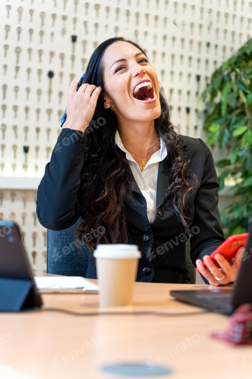 Preview: Business woman very happy after the success of the meeting