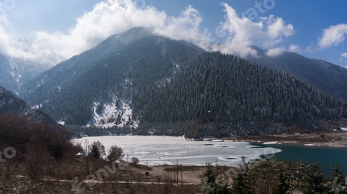 Preview: Landscape view on the frost mountain lake