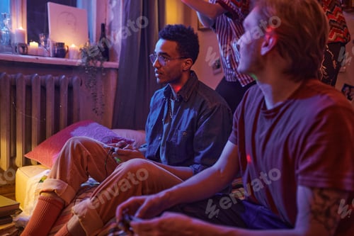Preview: Friends playing video game at home