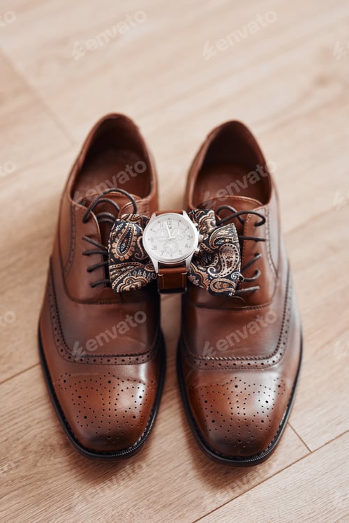 Preview: Ready to make you look dashing. Cropped shot of mens shoes and accessories.