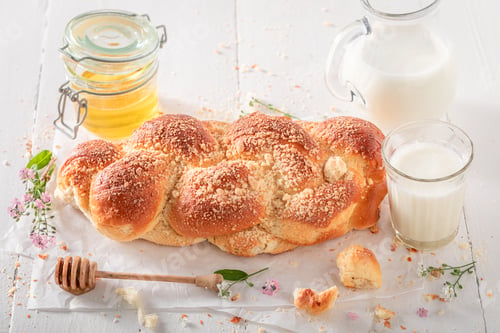 Preview: Delicious golden challah baked in a home bakery.