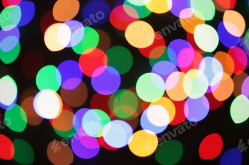 Preview: Beautiful colorful lights on dark background. Bokeh effect