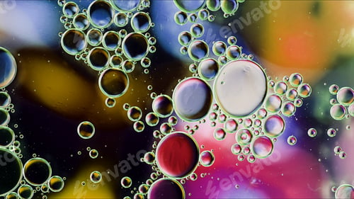Preview: Abstract Colorful Food Oil Drops Bubbles and spheres Flowing on Water Surface