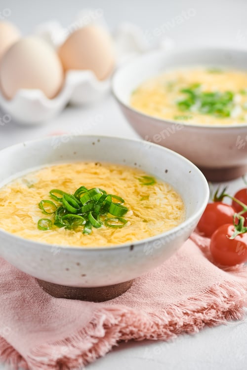 Preview: Delicate Egg Drop Soup Garnished with Fresh Greens
