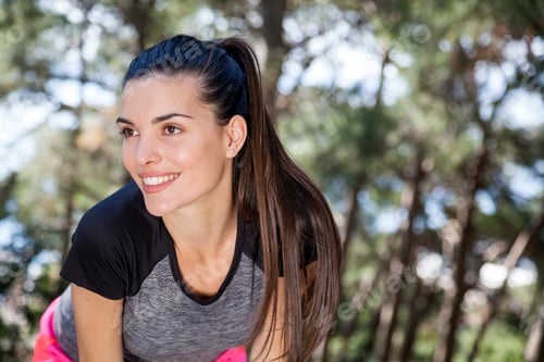 Preview: Young female runner taking a break in park, Split, Dalmatia, Croatia
