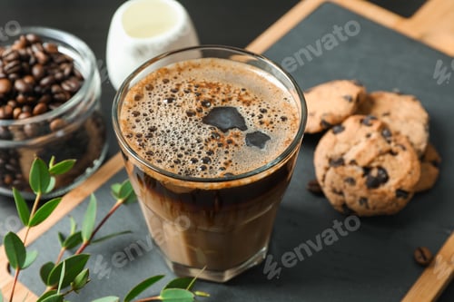 Preview: Coffee time accessories on black table, space for text and closeup. Break time