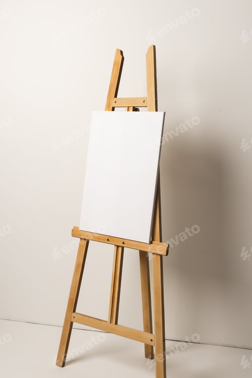 Preview: Blank Canvas on Easel Against White Background