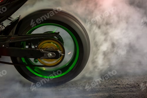 Preview: Motorbike burning tire rubber on road, Motorbike wheel drifting and white smoking on track