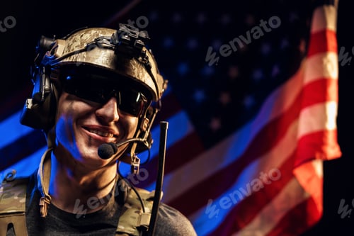 Preview: Portrait of special forces soldier in glasses and helmet against US national flag