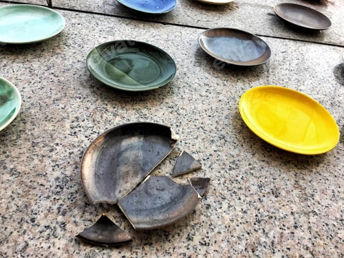 Preview: ⭐️⭐️⭐️ Nominated ⭐️⭐️⭐️
Colorful clay plates hang on the wall
