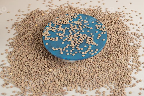 Preview: Green lentil beans on the concrete background