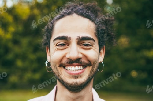 Preview: Young happy man smiling on camera outdoor - Main focus on nose