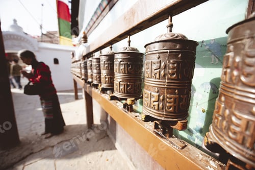 Preview: Closeup shot of Bian Zhong with Hindu writing and a blurred people in the background