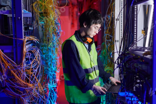 Preview: Young Technician Setting Up Internet Network