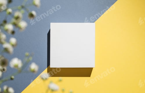 Preview: White cube, podium or box with shadow on diagonally divided yellow and blue background