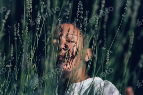 Preview: Abundance Concept. Mindful Woman Feeling Good, Enjoying the Scent of Lavender Flowers