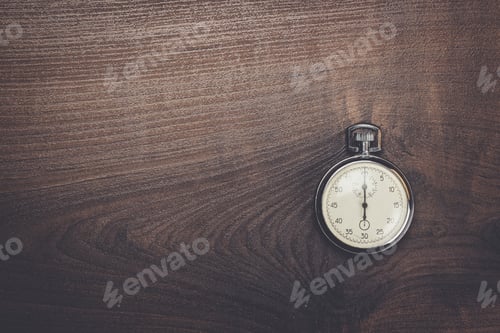 Preview: Silver Stopwatch on Dark Wood Background