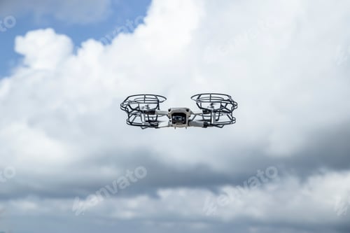 Preview: Low Angle View Of Drone Against Cloudy Sky