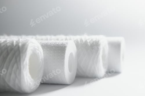 Preview: filter cartridges for water on a white background. Installation of reverse osmosis water system.