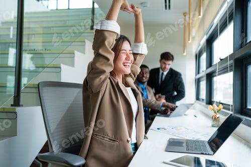 Preview: Successful businesswoman working at her office desk.