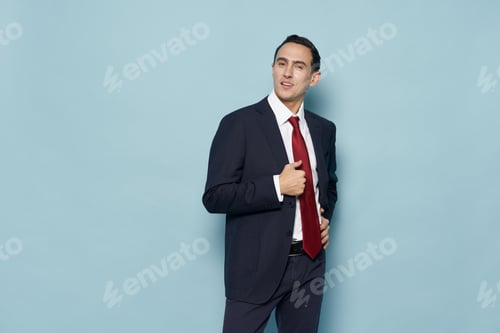 Preview: cheap cars in classic suit and red tie on gray background cropped view