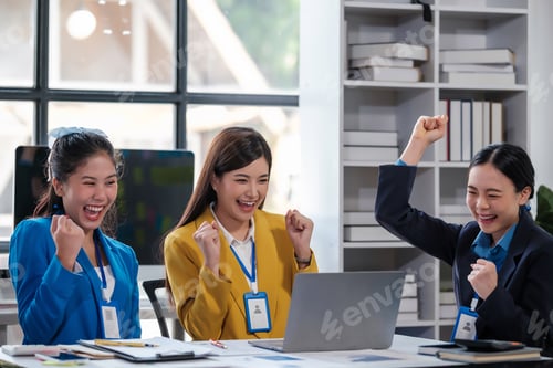 Preview: Happy overjoyed business team celebrate corporate victory