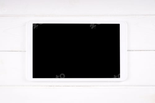 Preview: tablet computer with empty display on white wood