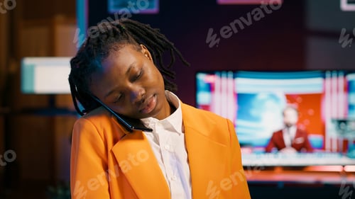 Preview: African american student answering call on mobile phone line