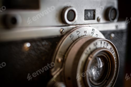 Preview: Selective focus shot of an old analogue photo camera detail