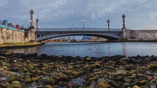 Preview: Low-angle of the La Concordia bridge view against a cloudy and gloomy sky, Matanzas, Cuba