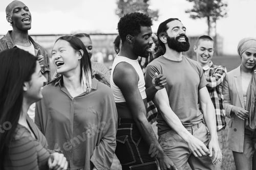 Preview: Young diverse people having fun outdoor dancing together