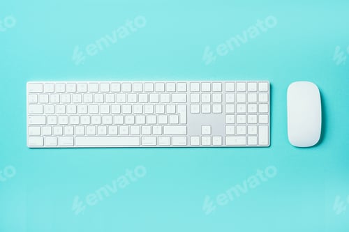 Preview: White mouse and keyboard on blue background. Top view. Copy space. Flat lay. Remote job, work. Home