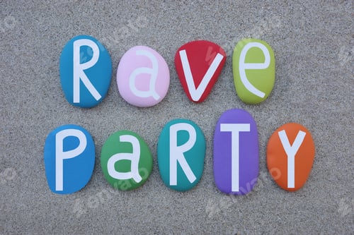 Preview: Rave Party text composed with hand painted multi colored stone letters over beach sand