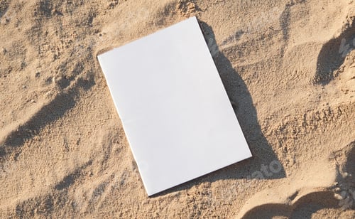 Preview: blank magazine mockup on sandy beach