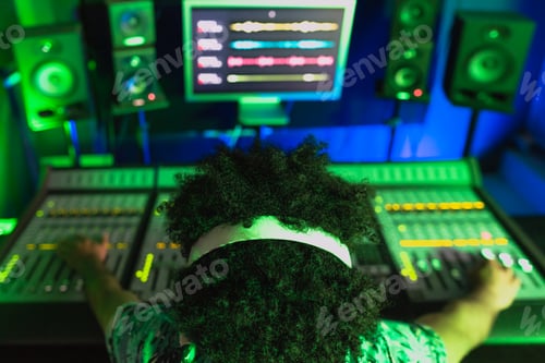 Preview: Young Afro man working in music recording studio
