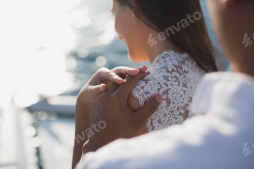 Preview: Wedding couple is hugging on a yacht. Beauty bride with groom.