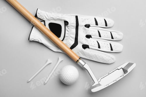 Preview: Set of golf equipment on grey background, flat lay