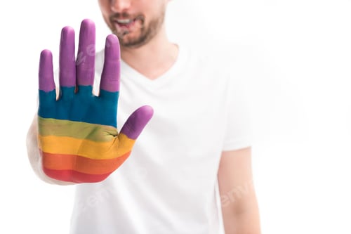 Preview: cropped image of homosexual man showing hand painted in colors of pride flag isolated on white,