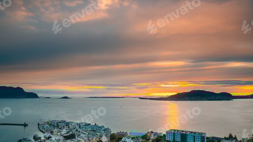 Preview: Alesund, Norway. Amazing Natural Bright Dramatic Sky In Warm Colours Above Alesund Valderoya And