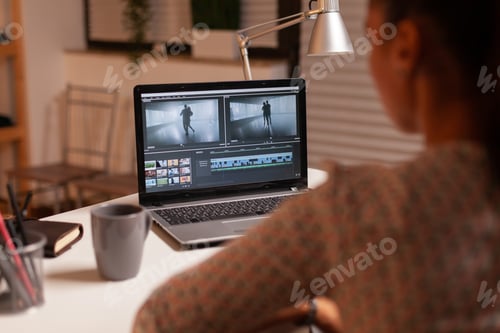 Preview: Brunette video editor works with footage
