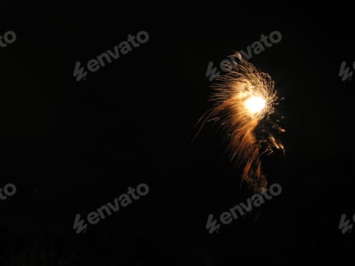 Preview: View of the yellow fireworks in the night sky