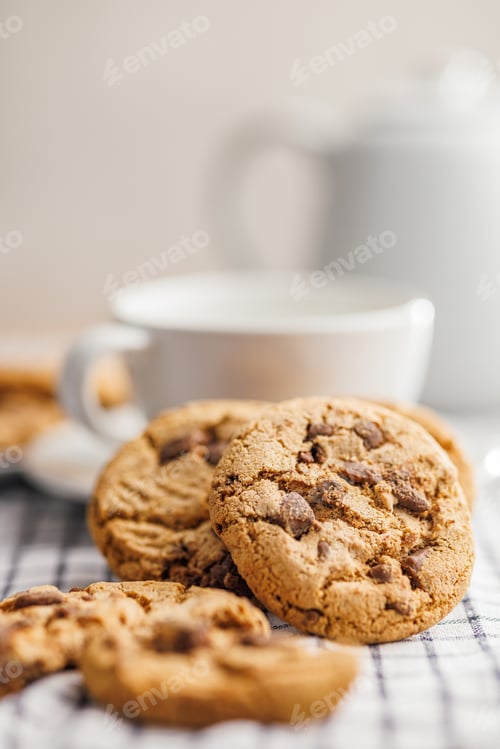 Preview: Sweet chocolate cookies on checkered napkin.