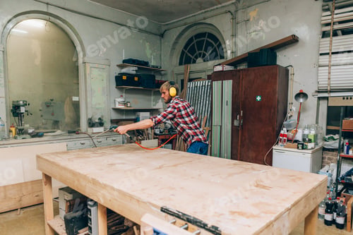 Preview: carpenter at work in his workshop