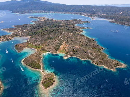Preview: Aerial view of an island on Sithonia Peninsula, Greece, with beaches and rocks, surrounded by
