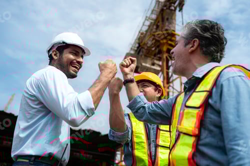 Preview: Group of workers at construction site are discussing construction progress